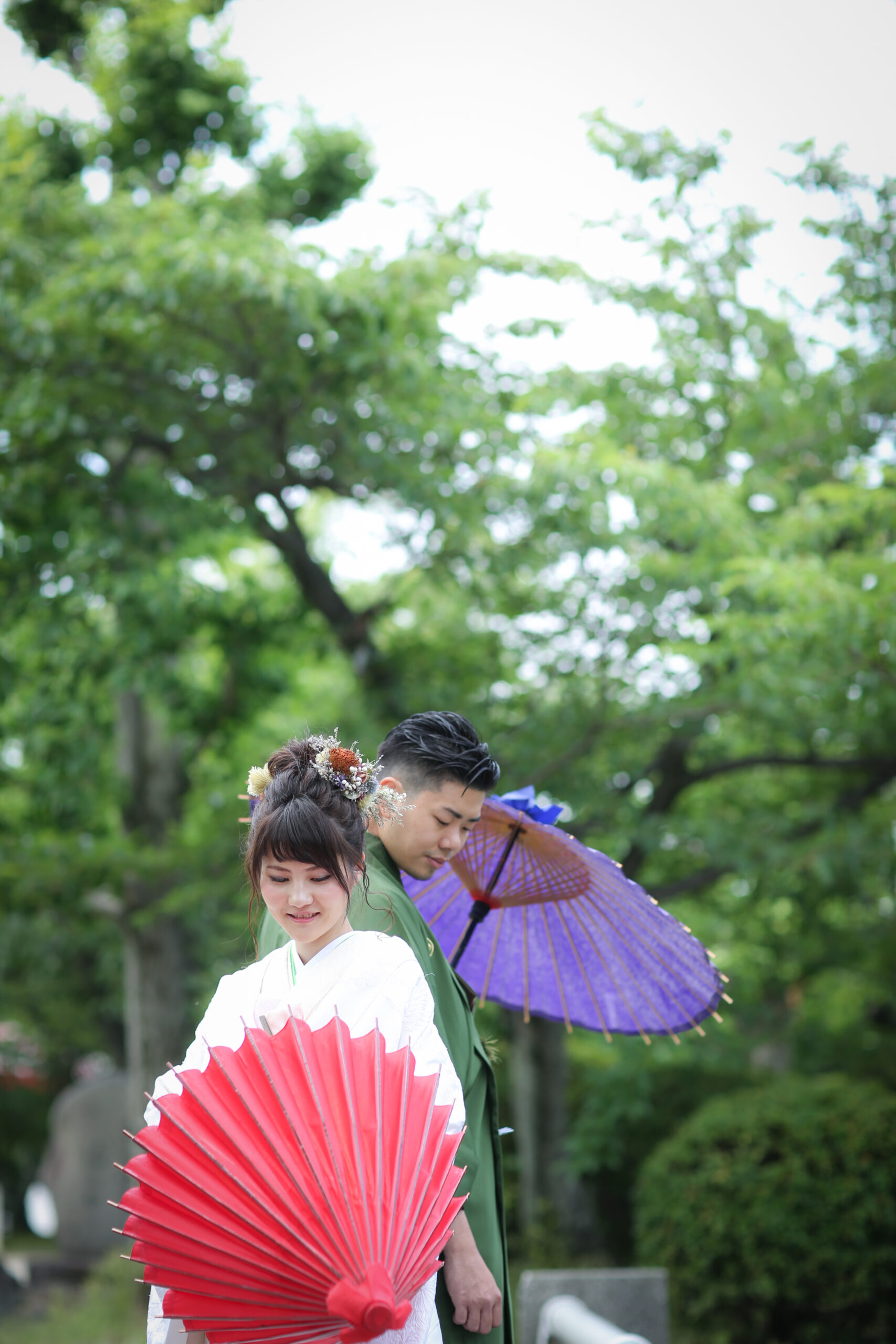 九華公園の全景。かつての桑名城跡に広がるお堀と石垣、緑豊かな園内の美しい風景